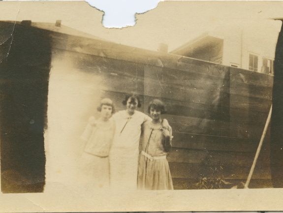 VicVioscaAlbum_007 (2295 visits) On back: Louise Fernandez, Marie Carbfal, Juanita Fernandez. In yard - Carbafal home - Canal St. VicVioscaAlbum_007