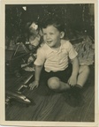 VicVioscaAlbum_076 -- Victor Willard Viosca Jr. (Vic)On back Vic - 3.5 yrs. 12-25-42, Under Xmas tree