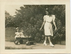 VicVioscaAlbum_078 -- On back: Juanita "Juan" Fernandez and Victor Willard Viosca Jr (Vic) - in wagon. Gloria Fernandez pulling wagon.