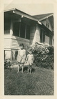 VicVioscaAlbum_084 -- On back: Victor Willard Viosca Jr. (Vic)  - 6 yrs. Rene Charles Viosca - 3 yrs. In side yard on Catina St.  Roll(047)