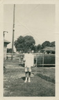 VicVioscaAlbum_095 -- On back: Rene Charles Viosca, First Holy Communion 8 yrs old. Roll(903E)