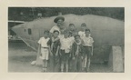 VicVioscaAlbum_103 -- Mrs. Mary Carpri  taken with cub scouts on trip - in Jackson Square. Rene [Charles Viosca front middle] and Lester Alfortish in front row, Vic [Victor Willard Viosca Jr.] next to Mrs. Mary Roll(324)