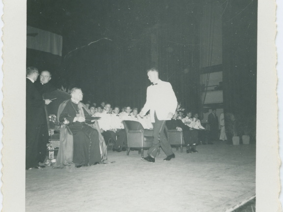 VicVioscaAlbum_121 (1472 visits) On back: Victor Willard Viosca Jr (Vic) receivng diploma (Jesuit) on state in Auditorium. Roll(810) VicVioscaAlbum_121